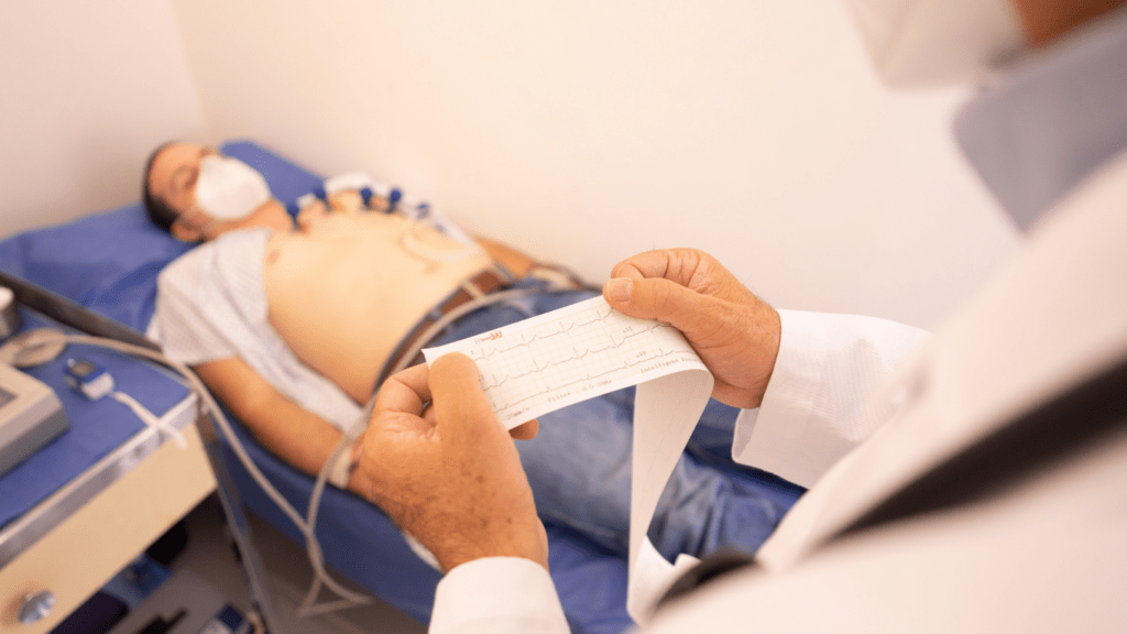 A doctor checking a patient's blood pressure