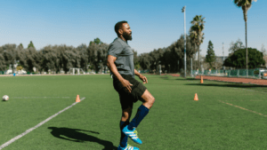A person is stretching their leg