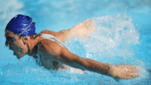 A person swimming in a pool
