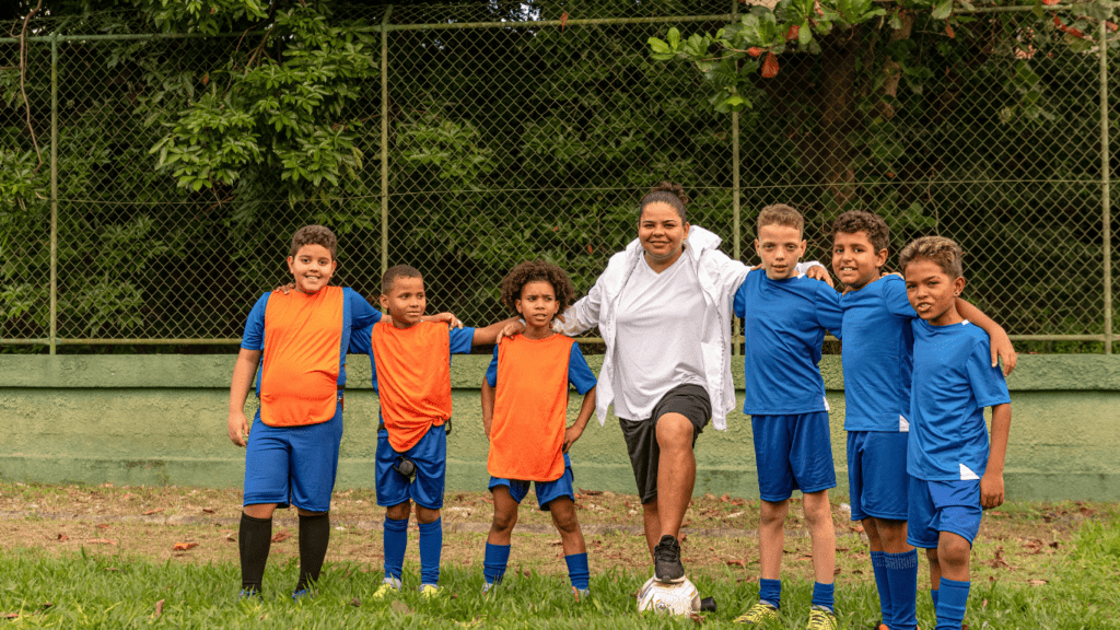 a group of soccer players posing for a photo